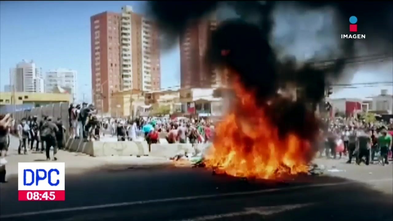 Queman pertenencias de migrantes venezolanos en Chile