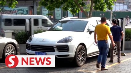 Unpaid by Evergrande, supplier sells Porsche and home to rescue his business