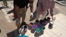 Mardin'de kaymakam ve milli eğitim müdürü okul duvarını boyamak için kolları sıvadı