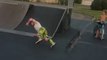 Girl Falls While Skateboarding Downhill on Ramp