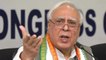 Congress workers protested outside Kapil Sibal's house