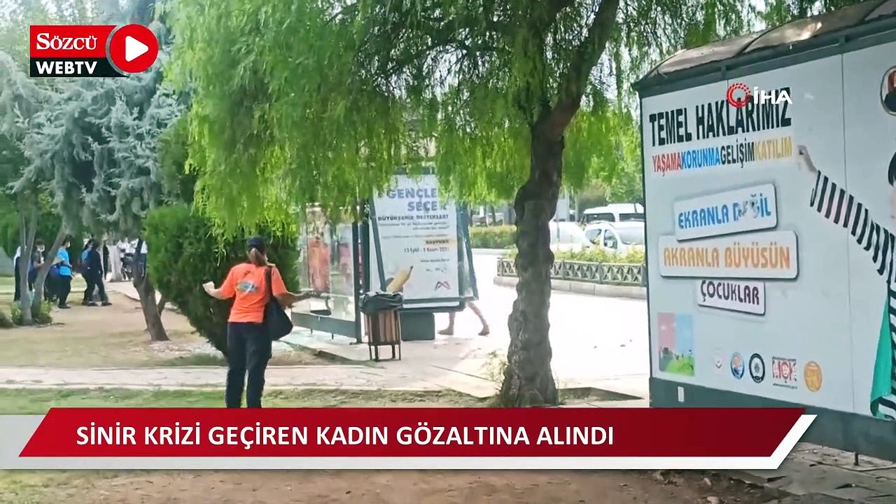 Sinir krizi geçiren kadın otobüs durağına saldırdı