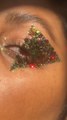 Woman Creates Eye Makeup Look by Artistically Sticking Glitter Around Her Eye
