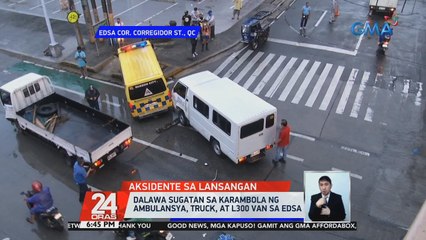 Truck, tumagilid matapos bumangga sa mga concrete barrier paakyat ng Quezon Avenue flyover | 24 Oras