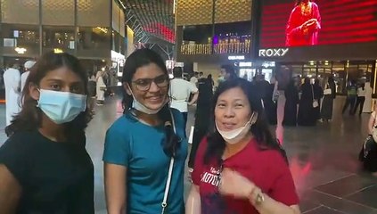 Work colleagues and friends Stacey, Shalima and Gemma enjoy the opening ceremony at City Walk