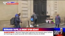 Mort de Bernard Tapie: des passants déposent des fleurs devant son domicile à Paris
