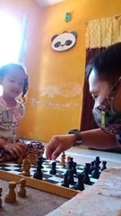 Playing chess with my daughter