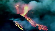 La Palma volcano spews lava