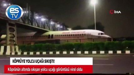 Köprüye yolcu uçağı sıkıştı!
