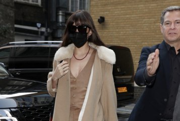 Dakota Johnson Wore a Vest as a Shirt with Nothing Underneath