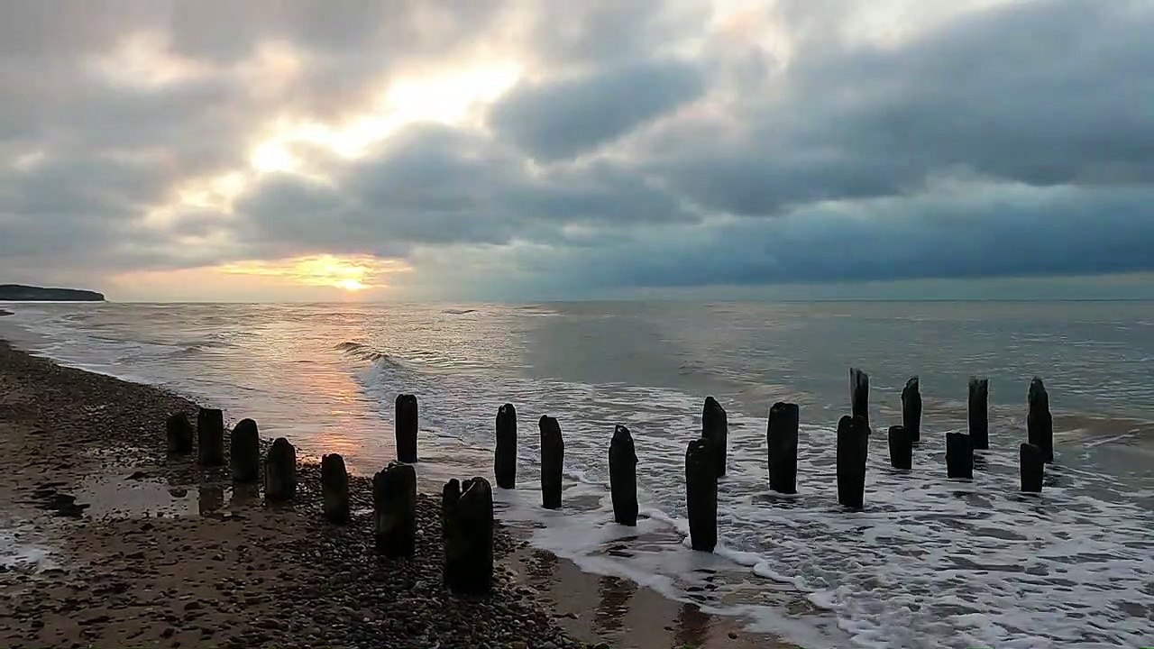 Sunset, Sea, Coast, Piles, Pales _ 4K Video Stock Free Footage _ No Copyright _ 60fps Relaxing Clip