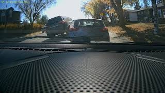 Dashcam Catches Vehicle Side-Swiping Parked Car