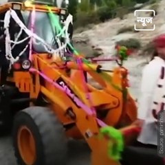 Pakistan’s Newly Wed Couple Use A JCB For Their Wedding Procession