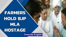 Farmers hold BJP MLA Kamal Gupta hostage, police bail him out: Watch | Oneindia News