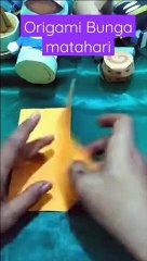 Membuat origami bunga matahari