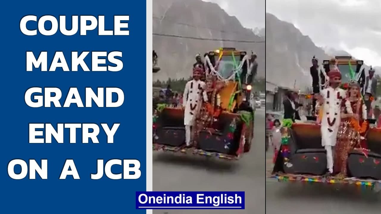 Pakistani couple makes grand entry on a JCB | Oneindia News