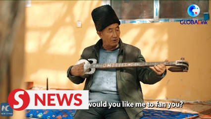 Happy 83-year-old man plays beautiful music in Xinjiang