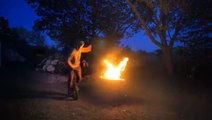 Guy Jumps Over Fire Pit While Balancing On a Unicycle