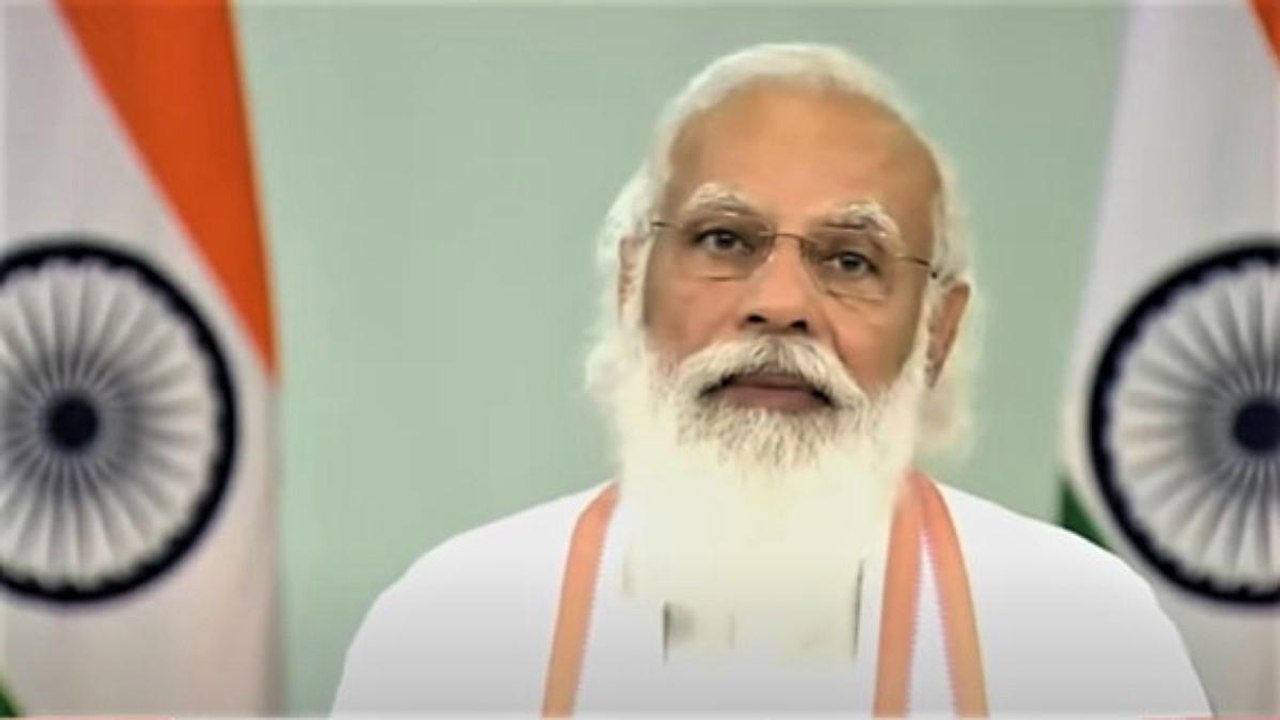 PM Modi interacts with Svamitva Yojana benefici...