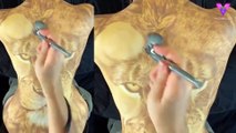 Talentoso artista convierte la espalda de su novia en la cara de un león_