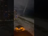 Water Spout Climbs onto Land and Dissipates