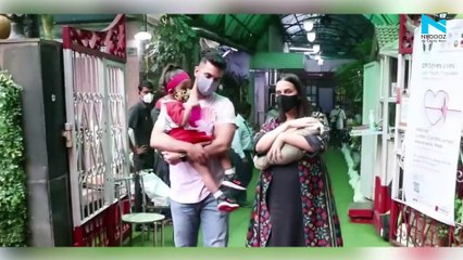 Neha Dhupia hides her baby boy's face from paparazzi during first public appearance