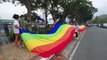 LGBTQ+ members supporting Sara Duterte carry a rainbow flag