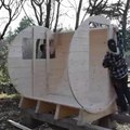 building outdoor barrel sauna