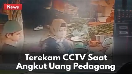 TEREKAM CCTV !! SEORANG WANITA ANGKUT KANTONG UANG PEDAGANG !!