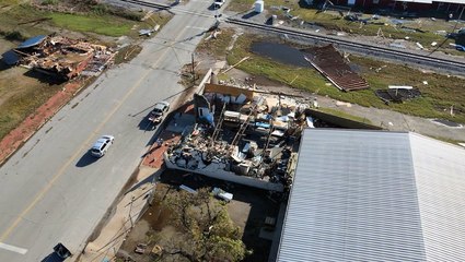 Families scramble to clean up tornado damage before another round of storms