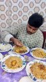 This boy is betting 20 thousand rupees, see how he is eating that plate of raw biryani