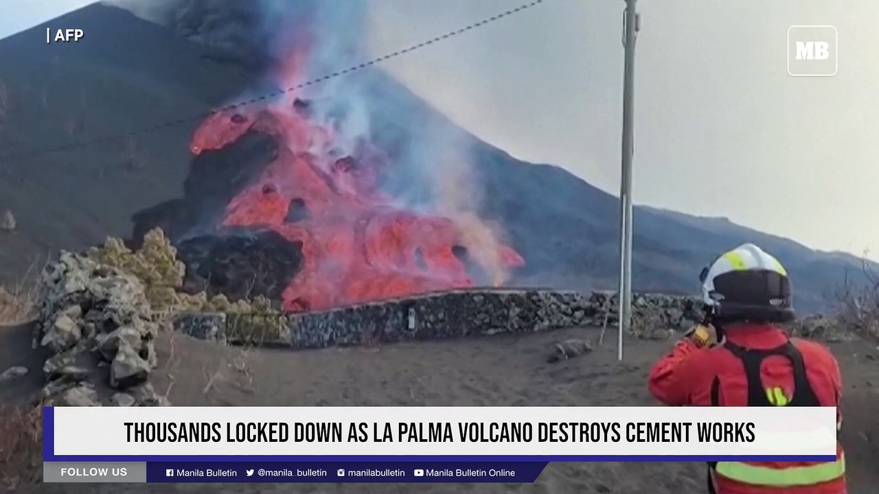 Thousands locked down as La Palma volcano destroys cement works