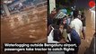 Waterlogging outside Bengaluru airport, passengers take tractor to catch flights
