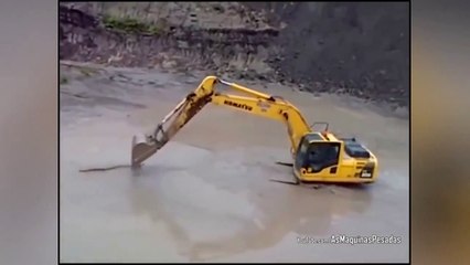 Il chasse des crocodiles avec sa pelleteuse