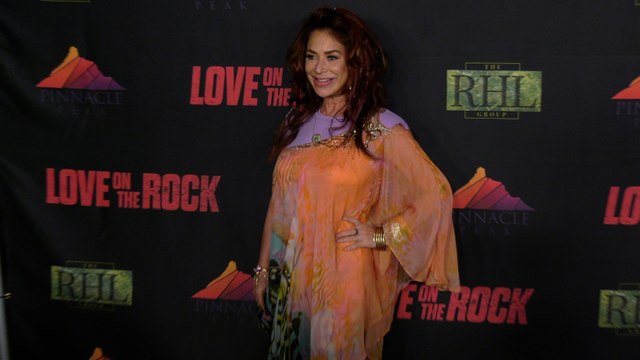 Claudia Wells attends the Love on the Rock Red Carpet Premiere in Los Angeles