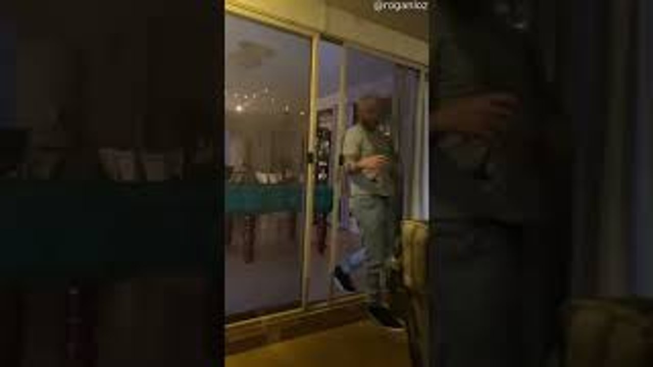 Man with Beverage Bested By Screen Door