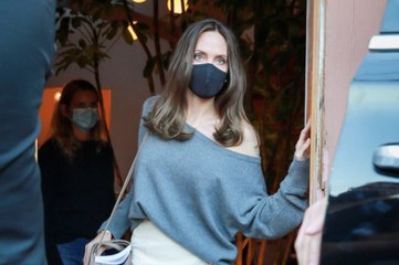 Angelina Jolie Paired an Off-the-Shoulder Sweatshirt with a Chic Midi Skirt