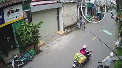 Motorcyclist Nearly Hit by Falling Piece of Roof