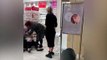 Young girl left screaming as she's forced to get her ears pierced