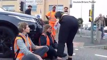 Furious mum pushes protesting Insulate Britain protesters with Range Rover