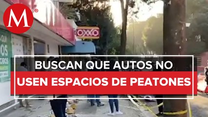 Vecinos restauran banqueta dañada por negocio CdMx