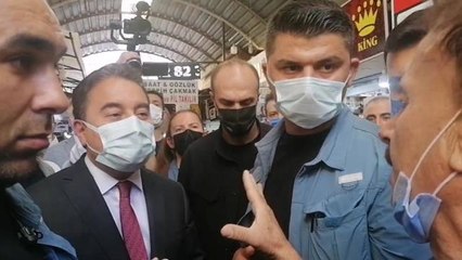Babacan'a esnaf gezisinde sert tepki