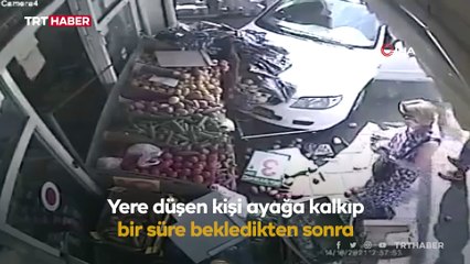 Araç çarptı yine de alışverişe devam etti