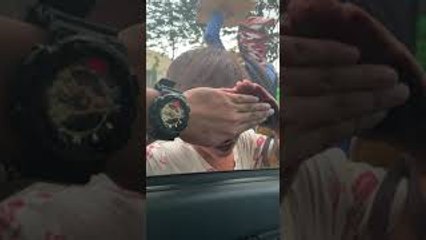 Man Uses Hand to Block Peeping Kid