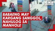 Babaeng may kargang sanggol, nahulog sa manhole | GMA News Feed