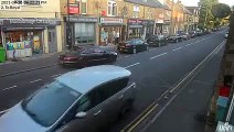 Off-road biker does wheelie on Sheffield road