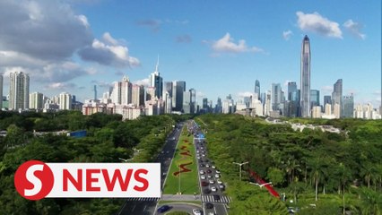 China's GDP expands 9.8 pct in first three quarters