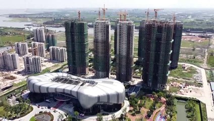 Crises na construção e na energia fazem abrandar economia chinesa