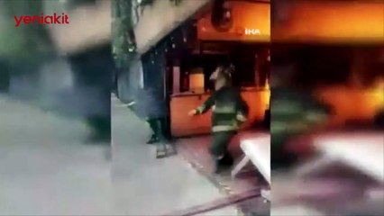 Sosyal medya bu itfaiyeciyi konuşuyor! Alev alan tüp gazı sırtına alarak uzaklaştırdı