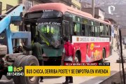 Choque de buses en VMT: dos conductores heridos y vehículo quedó empotrado en vivienda